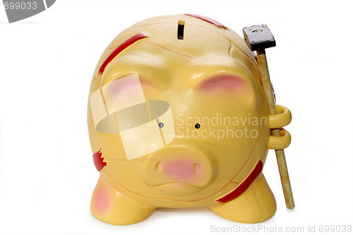 Image of Piggy bank with hammer