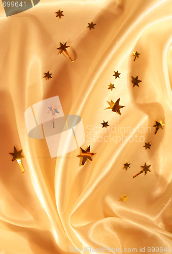 Image of New year holiday golden satin as background 