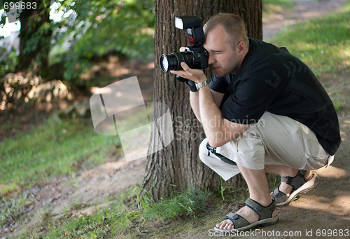 Image of Man with photocamera