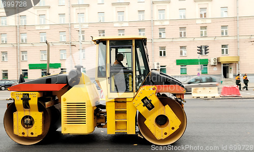 Image of asphalting road roller compactor