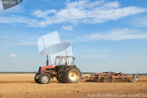 Image of Agriculture ploughing tractor outdoors