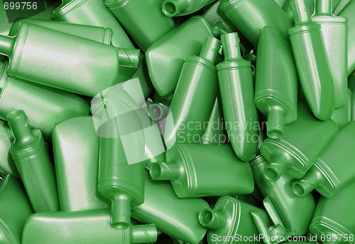 Image of Heap of green plastic bottles