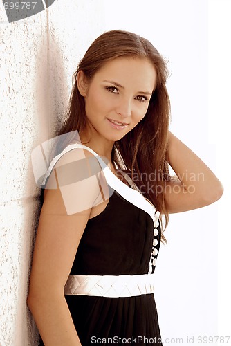 Image of Beautiful young girl outdoors in summer