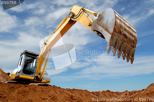 Image of Excavator loader in sandpit