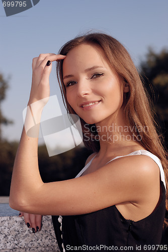 Image of beautiful girl outdoors