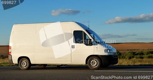 Image of White delivery minitruck