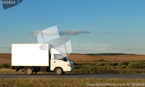 Image of White Light-duty truck