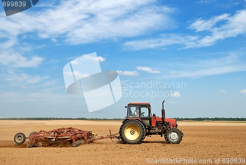 Image of Agriculture ploughing tractor outdoors