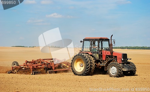 Image of Ploghing tractor
