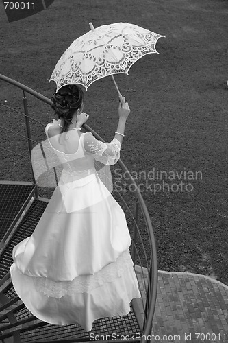 Image of Bride with umbrella. BW.