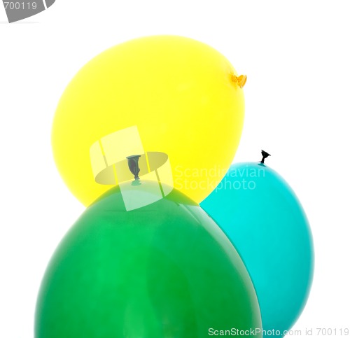 Image of green, yellow and blue balloons