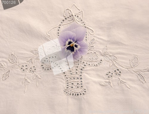 Image of pansy on tablecloth