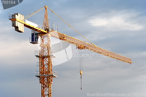 Image of Single yellow tower crane