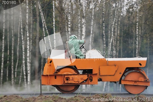 Image of Orange road roller