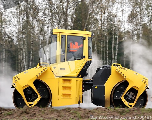 Image of Yellow road roller