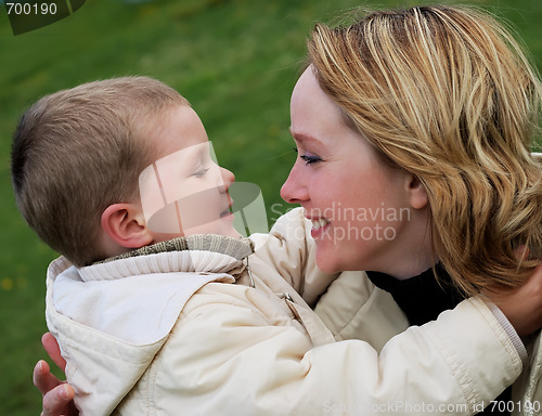 Image of happy mother and son (focus on woman)