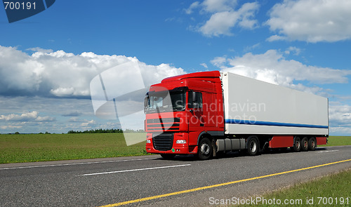 Image of red lorry with white trailer 