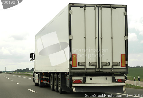 Image of rear of white truck on the highway