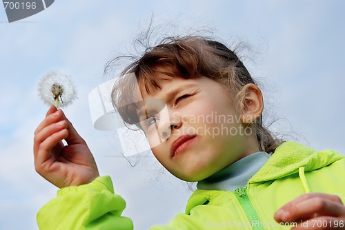 Image of girl with dandelion