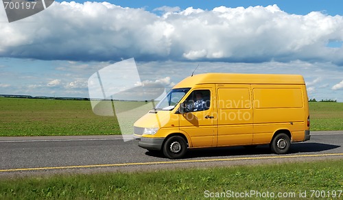 Image of yellow delivery truck