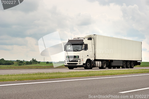 Image of white truck on highway