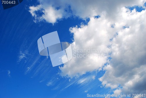 Image of Crazy Clouds In Blue Sky