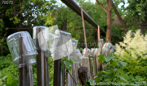 Image of Fence with Jars