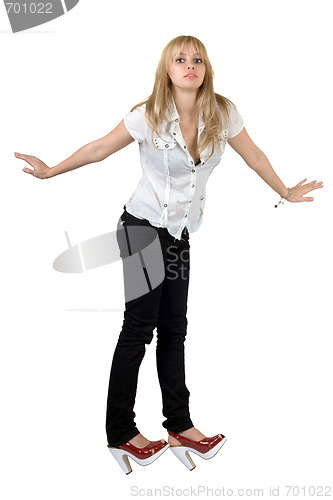 Image of Playful pretty young woman. Isolated on white