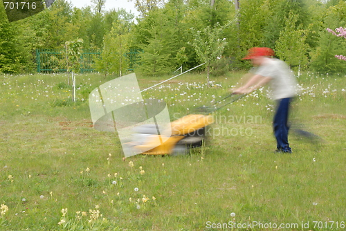 Image of mowing grass