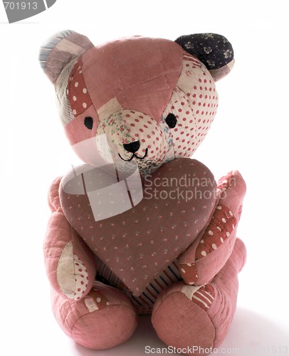 Image of quilted bear with calico heart