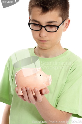 Image of Boy holding a piggy bank money box