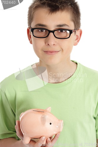 Image of Smiling boy holds a money box