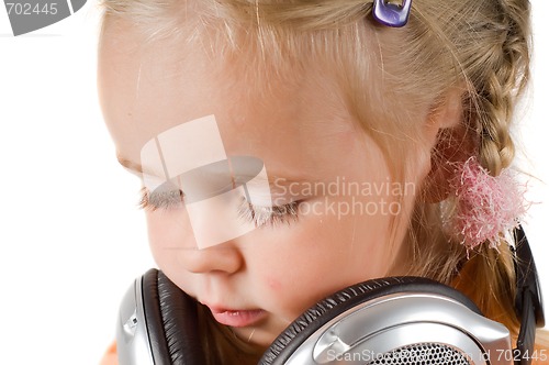 Image of Little girl with headphones