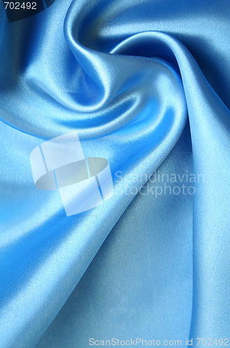 Image of Smooth elegant blue silk as background