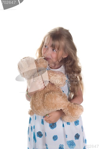 Image of Little girl playing with toy