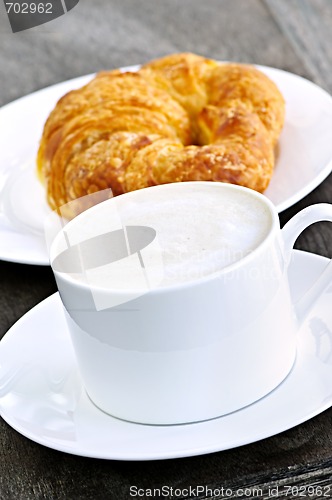 Image of Latte coffee and croissant