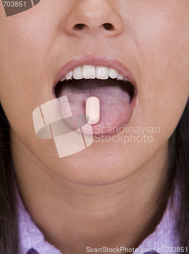 Image of Pill on the tongue