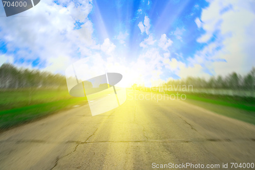 Image of road and sun