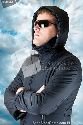 Image of man in black sunglasses