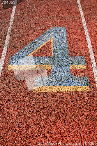 Image of Number Four on a Running Lane