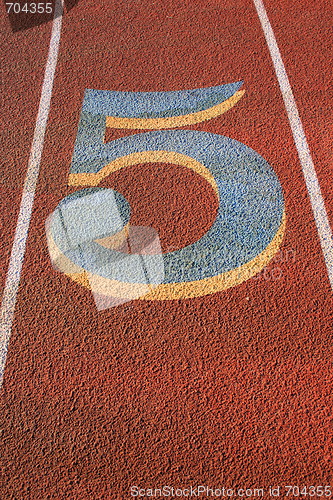 Image of Number Five on a Running Lane