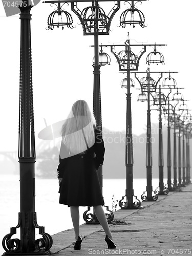 Image of Beautiful blonde on promenade