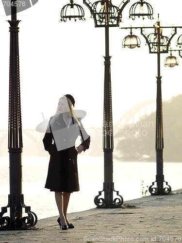 Image of Beautiful blonde on promenade