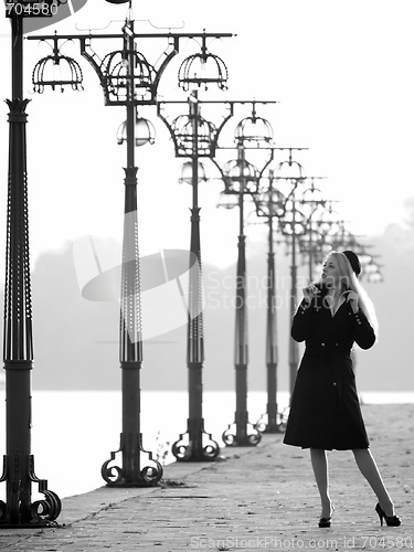 Image of Beautiful blonde on promenade