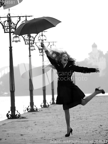 Image of Weird blonde with umbrella