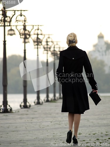 Image of Beautiful blonde on promenade