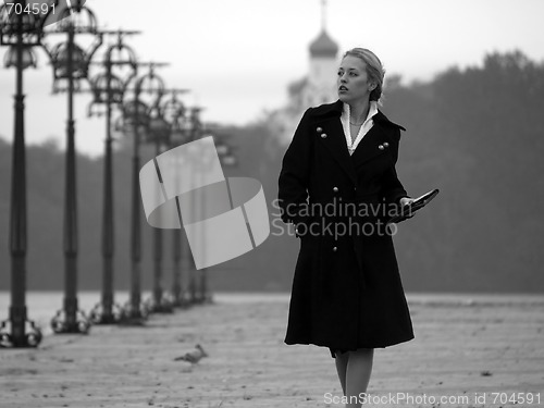 Image of Beautiful blonde on promenade