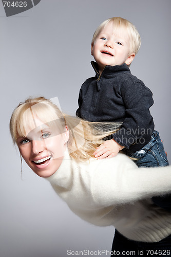Image of Happy caucasian mother and son