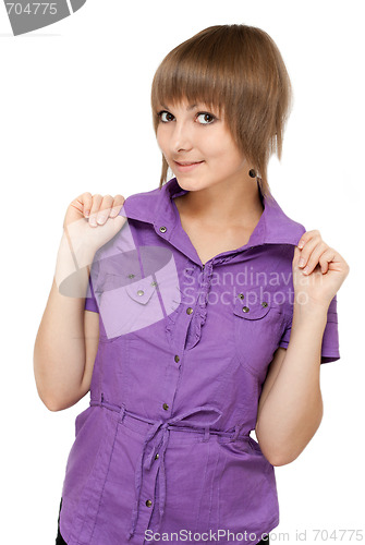 Image of Young girl in violet blouse looks