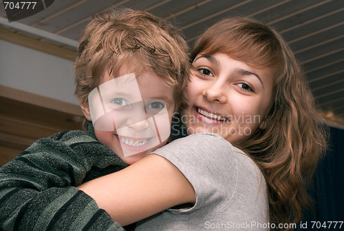 Image of Girl and boy smile